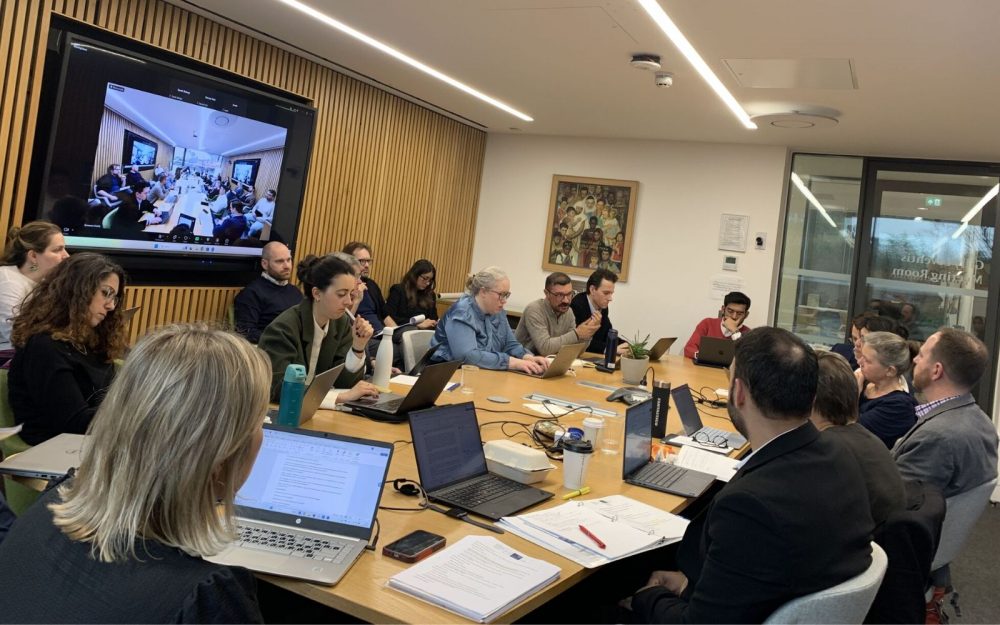 A view of a group of global experts gathered around a roundtable 