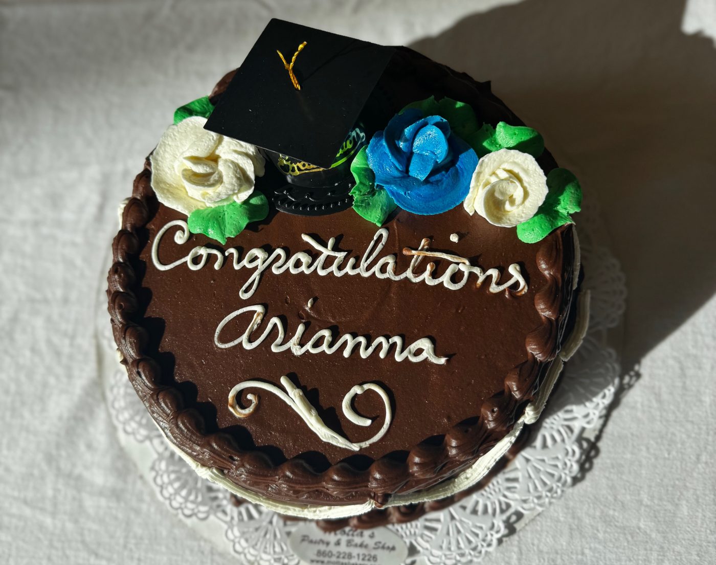 Photo of a cake celebrating Arianna Landesbaum, the first graduate of the MSSRIB program.